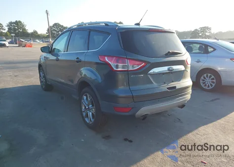 2015 Ford Escape Titanium z USA, uszkodzony, nr VIN 1FMCU9JX9FUA58932
